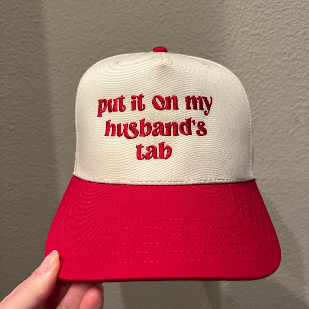 Put It On My Husband’s Tab Trucker Hat
